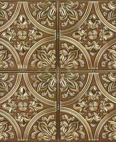 an intricately designed wall panel with gold paint