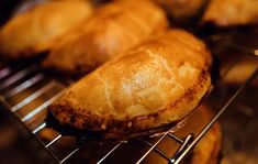 several pastries cooling on a rack in the oven