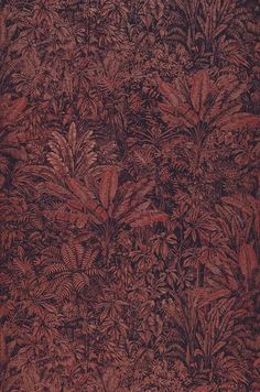 a red and black wallpaper with lots of leaves