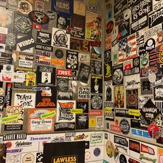 there are many stickers on the wall