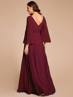 This custom size floor-length chiffon evening dress features a stunning deep V-neck design. The A-line silhouette is complemented by delicate ruffle sleeves, creating a timeless and sophisticated look perfect for any formal occasion. Length: Floor length. Sleeve Style: Long sleeves. Closure: It is concealed a zipper up the back. Undergarments: It is padded, with lining. Fabric:The garment comprises Chiffon. Stretch: Fabric is no stretch. Chiffon V-neck Pleated Maxi Dress, Formal Chiffon V-neck Gown, Elegant Flowy V-neck Gown, Floor-length Chiffon Pleated Maxi Dress, Chiffon Maxi Dress With Pleated Bodice And V-neck, Floor-length Pleated Chiffon Maxi Dress, Pleated Chiffon Floor-length Maxi Dress, Elegant V-neck Gown With Pleats, Elegant V-neck Gown With Pleated Detail