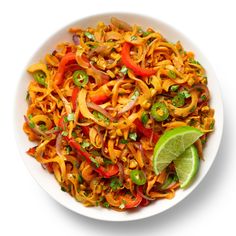 an image of a plate of food with noodles and vegetables