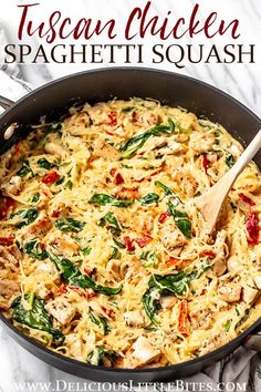 a skillet filled with chicken, spinach and spaghetti