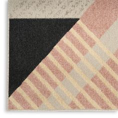 an area rug with different colors and patterns on it, including black, beige, pink, and white