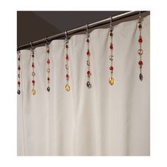 a curtain with beads hanging from it's side