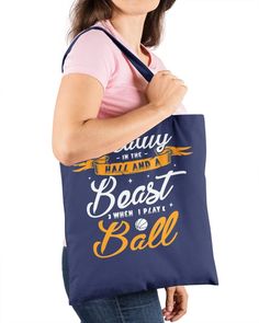 a woman holding a blue bag that says, stay busy play with a ball