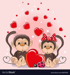 two monkeys sitting next to each other holding a heart