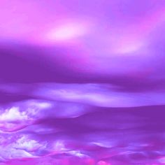 the sky is filled with purple and pink clouds