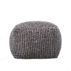 a gray round ottoman with small squares on the top and bottom, sitting against a white background