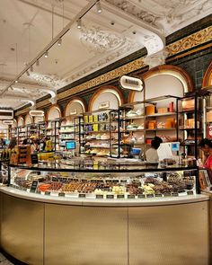 the inside of a store with many items on display