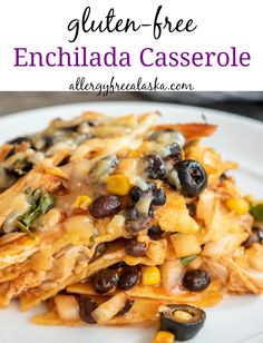 an enchilada casserole with black olives, corn and cheese