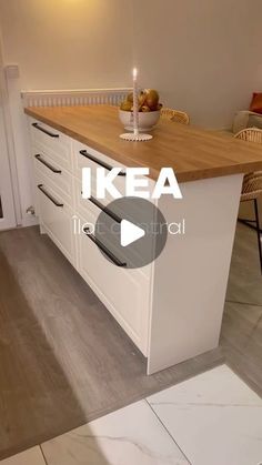 an image of a kitchen setting with the words ikea in front of it and a bowl of fruit on the counter