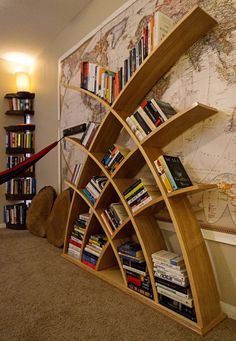 the bookshelf is made out of wood and holds many books