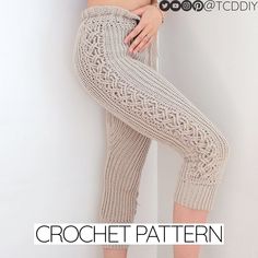 there is a woman standing on the floor wearing leggings with crochet pattern