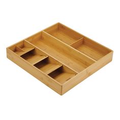 an empty wooden tray with three compartments