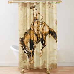 a shower curtain with an image of a cowboy riding a bucking bronco horse