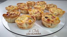 there are many mini quiches on the plate