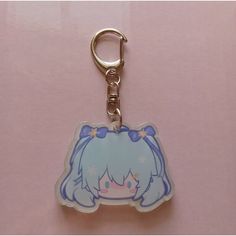 a key chain with an anime character on it