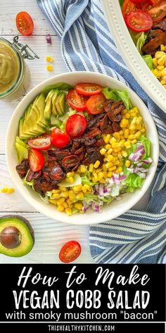 a salad with corn, tomatoes and avocado in it on top of a white table