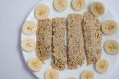 sliced bananas and granola on a white plate