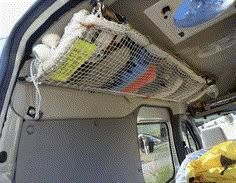 the back end of a van filled with items