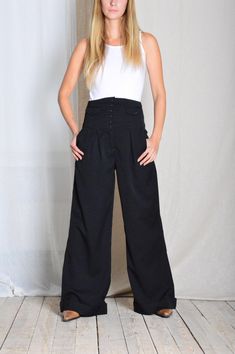 Vintage 90s Black High Waisted Corset Style Wide Leg Pleated Formal Pants Marked size: 38 Estimated Size: Waist 26 In Size Small Inside leg: 30 In (76 cm) Pants total length: 44.1 In (112 cm) Waist: 26.4 In (67 cm) Rise: 14.2 In (36 cm) Material: 72% poly 25% viscose 3% elastane The model in this pic is 170cm tall (Size S) 🥦 Dare to dream big 🔑 Be sure to contact us with any questions :) Formal Pants, Corset Style, Vintage 90s, Capri Pants, Wide Leg, High Waisted, Clothes For Women, Pants, Clothes