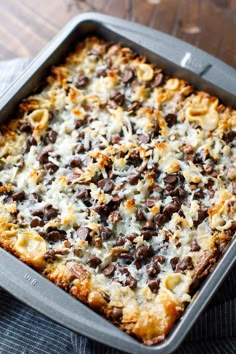 a casserole dish with chocolate chips and cheese