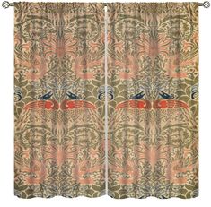 curtains with an abstract design on the top and bottom, both in green and orange