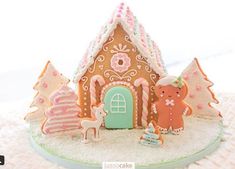 there is a gingerbread house decorated with icing