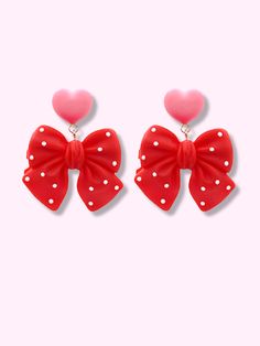 Polka Heart Red Bow Earrings | sassyshortcake.com | Sassy Shortcake Heart-shaped Earrings With Bow For Gift, Heart Shaped Bow Earrings For Party, Party Heart Earrings With Bow, Cute Bow Jewelry For Valentine's Day, Playful Red Jewelry For Valentine's Day, Heart-shaped Bow Earrings For Party, Pink Heart-shaped Jewelry With Bow, Cute Heart Print Earrings For Valentine's Day, Cute Red Heart Earrings For Valentine's Day