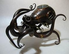 an octopus shaped teapot is sitting on a table