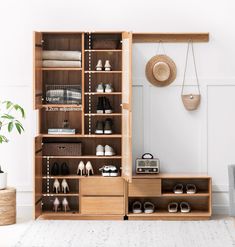 an organized closet with shoes and other items