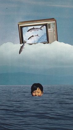 a boy is floating in the water with a tv above his head and two dolphins flying over him