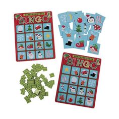 two christmas themed game boards and pieces of stickers