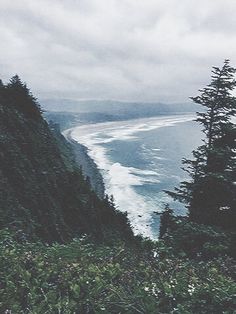 a view of the ocean from a cliff