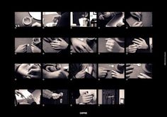 a black and white photo of hands holding something in each other's hands with the words love written on them