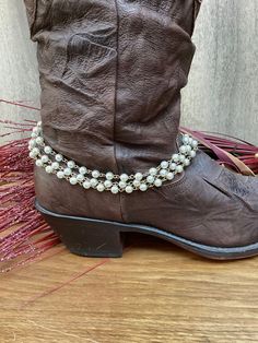 This is a white pearl 3 strand boot bracelet repurposed from a vintage necklace. The pearl chain strands have pale gold wires. It is perfect for bridal jewelry. It's finished with a gold lobster clasp & gold metal chain. It measures 16" in length.  This item is sold as a single.  This piece is designed for special occasions especially weddings. Wear it to concerts, festivals, parties, weddings, or anytime when you need that extra glitz & glam. Made in the USA. Return & Exchange Policy I will gla Western Boot Jewelry, Boots With Pearls, Boots Bracelets, Boot Bracelet Chic, Boot Jewelry Custom, Gold Boots, Boot Bracelet, Boot Bling, Wedding Boots