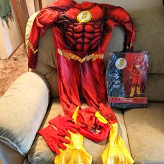 the flash costume is sitting on top of a couch