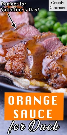 an orange sauce is on top of some meat and green peas with the words, perfect for valentine's day