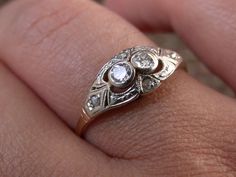 "WE SELL THIS NICE AND ANTIQUE RING MADE IN 18K GOLD,and platinum finished setting, DECORATED with 2 central genuine diamond 0.08ctw + 4 little genuine rose cut diamonds, IN VERY GOOD CONDITION , , PLEASE SEE THE PICTURES AND TAKE THEM AS A PART OF THE ITEM DESCRIPTION MEASURES HEAD 5/8\" x 5/16\" SIZE 7 3/4 WEIGHT 1.9gr if you need resize only request for free after buy As is a vintage antique item , it's unique , for that if you like to wear it , don't miss the opportunity, we gladly offer MIC Antique Rose Cut Diamond Ring For Anniversary, Antique Diamond Ring With Rose Cut For Anniversary, Antique Diamond Ring With Rose Cut Diamonds For Anniversary, Victorian Diamond Ring With Rose Cut Diamonds For Anniversary, Victorian Style Rose Cut Diamond Ring For Anniversary, Victorian Rose Cut Diamond Anniversary Ring, Victorian Diamond Ring With Accents For Gift, Vintage Art Deco Rings, Unique Rings Vintage