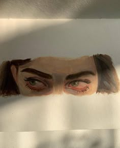 a drawing of a man's eyes and eyebrows