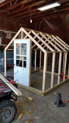 a building being built in the middle of a garage