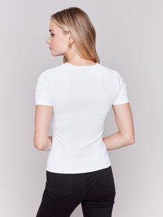 Experience the ideal blend of comfort and elegance with our Short-Sleeved Super Stretch Top. Made from ultra-flexible double layer fabric, this white top offers a comfortable yet form-fitting feel, providing unparalleled freedom of movement. Its minimalist design is perfect for layering or wearing alone for a sleek, polished look. Upgrade your wardrobe with this versatile essential, a true must-have. Slim fit Crew neckline Short sleeves Double layer, stretch fabric Classic Elastane Tops For Spring, Classic Tops For Spring, Fitted Crew Neck Tops In Sleek Style, Fitted Crew Neck Sleek Tops, Layering Fitted Top In Elastane, Classic Fitted Elastane Tops, Elegant Crew Neck Top With Minimal Stretch, Sleek Crew Neck Top With Minimal Stretch, Sleek Stretch Tops For Work