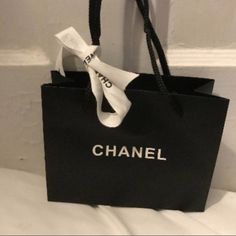 Chanel Shopping Paper Tote Gift Bag And A Chanel Ribbon New Authentic A Length Of Authentic, Unused Chanel Ribbon Will Accompany The Bag. 9.5” Width X 6.5” Length X 4.5” Depth Trendy Black Bag For Gifts, Black Bag With Dust Bag As Gift, Tifa Ff7 Remake, Black Gift Bag, Chanel Shopping, Magnolia Parks, Chanel Aesthetic, Chanel Black And White, Magnolia Park