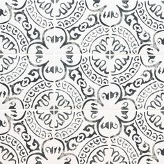 an intricately designed wallpaper with black and white designs