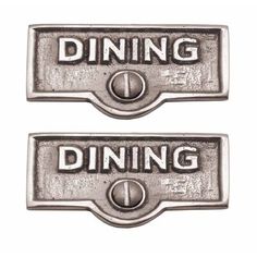 two metal signs that say dining and one is for the door to be opened or closed