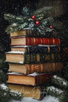 a stack of books sitting on top of a pile of snow next to a christmas tree