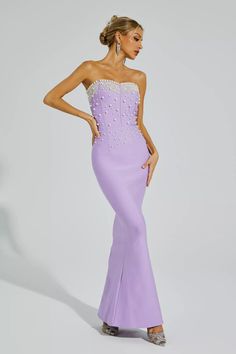 Pink Evening Dresses With Pearl Embroidery, Elegant Sleeveless Gown With Rhinestones, Sleeveless Beaded Dress With Fitted Bodice, Beaded Sleeveless Dress With Fitted Bodice, Pink Sleeveless Mermaid Evening Dress, Beaded Evening Dress With Fitted Bodice For Prom, Strapless Pink Mermaid Dress, Sleeveless Beaded Prom Gown, Sleeveless Beaded Gown For Prom Season