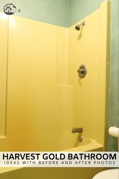 a bathroom with yellow walls and a white toilet sitting next to a bathtub in the corner