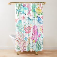 a shower curtain with colorful sea animals on it